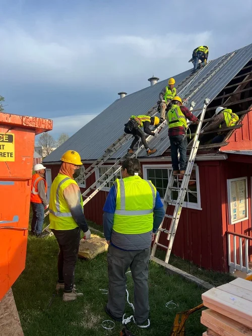 Metal roofing and exterior restoration at the Oxon Hill Farms visitor center by CS1 Construction.